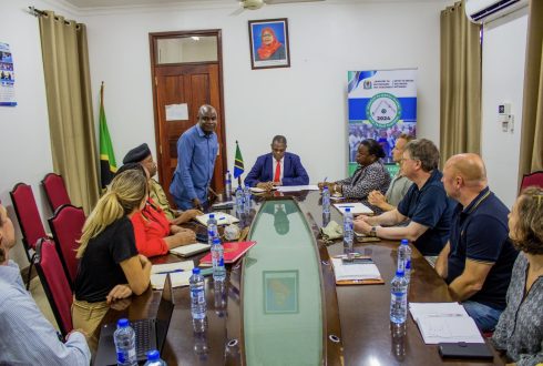 Meeting with the regional commissioner in Tanzania to discuss cashew sustainability.